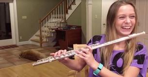 Dog Is Sick And Tired Of Hearing Teen Girl Practice Flute At The Dinner Table