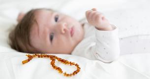 FDA Is Now Warning Parents To Stop Using Teething Necklaces & Bracelets Following Death Of 18-Month-Old