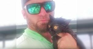Boat Captain Sees Someone Throw Cat Off Bridge - So He Drops Everything To Save Her