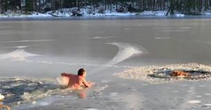 Man Takes Off Clothes And Jumps Into Freezing Water To Rescue Two Dogs That Fell Through Ice