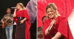 Kelly Clarkson est totalement surprise lorsque son mari la surprend sur scène lors de l'un de ses concerts