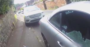 Officer Smashes Car Window To Rescue Dog Locked Inside