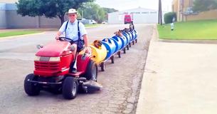 An 80-Year-Old Retiree Creates A 'Dog Train' To Bring Rescued Homeless Dogs Out On Adventures