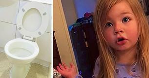 Une petite fille gronde son père pour avoir laissé le siège des toilettes surélevé