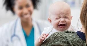 Method Called "The Hold" Soothes Crying Babies Demonstrated By Pediatrician
