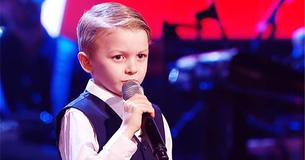Un enfant de 7 ans chante "Take Me Home, Country Roads" et impressionne les juges avec sa voix unique
