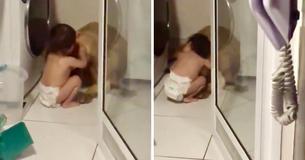 Un jeune enfant réconforte un chien terrifié pendant un orage dans une vidéo réconfortante
