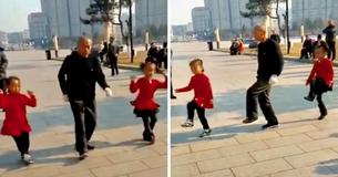 Un grand-père et ses petites-filles se mêlent au cœur du public avec leurs mouvements de danse