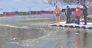 Brave Bystander Jumps Into Icy Pond To Rescue Drowning Dog