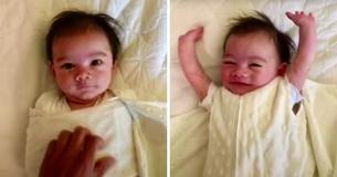 Chaque matin, un joyeux bébé démailloter jette ses bras en l'air 