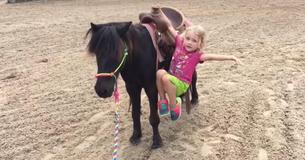 Young Girl Warms Hearts Around World By Learning Tricks On Her Pony
