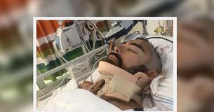 Padre eroe è lasciato a combattere tra la vita e la morte provando a salvare il figlio dopo che è caduto dal balcone