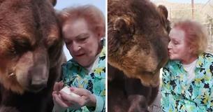 Actress Betty White Gives Giant Grizzly Bear A Kiss
