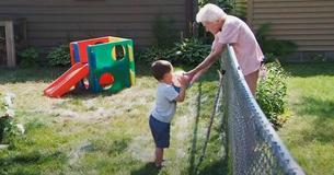2-Year-Old Boy Forges An 'Over-The-Fence' Friendship With His 99-Year-Old Neighbor Amid Lockdown