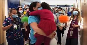 Little Girl Leaps Into Nurse's Arms In Order To Celebrate End Of Her Cancer Treatments