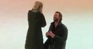 Man Proposes On Ice Rink Under Christmas Tree At Rockefeller Center