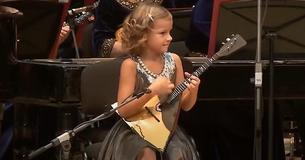 Mesmerizing 7-Year-Old Musician Leads Adult Orchestra’s Performance
