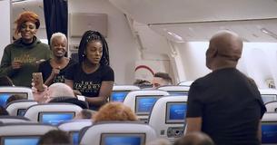 Travelers Watch In Awe As Flight Passengers Rise Up To Belt Out ‘Stand By Me’