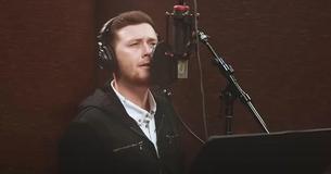 Singer Scotty McCreery Rounds Up Country Music’s Best Performers For Special Cover Of “Angels Among Us”
