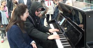 Man Cuts Off Women Playing Piano And Knocks Their Socks Off