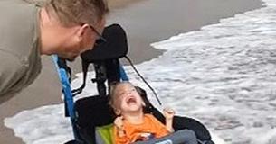 2-Year-Old Boy With Cerebral Palsy Enjoyed Beach For The First Time Thanks To A Special Wheelchair