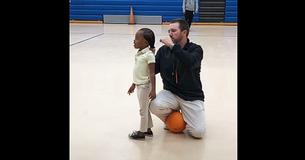 Mom Sees Candid Footage Of Basketball Coach Tying Her Daughter’s Hair & Thanks Him Publicly