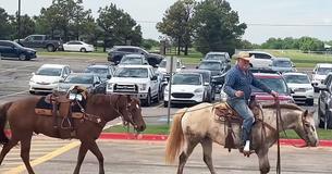 Father Gallops Up With 2 Horses To Pick Up Son On Last Day Of School