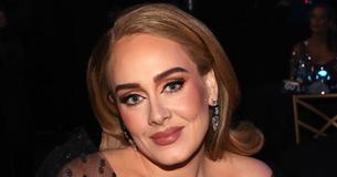 Adele Stuns In Bare-Faced Look While Rocking Gorgeous Carolina Herrera Mini Dress
