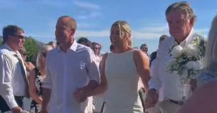 Bride Walks Down Aisle With 15 Important Men To ‘Honor’ Them For ‘Protecting’ Her