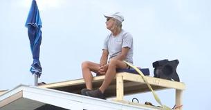 Man Slept On Garage Roof For 6 Days To Protest A Regulation