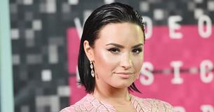 Demi Lovato Dazzles In Revealing Swimsuit Photo That Shows Off Figure