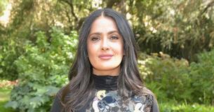 Salma Hayek Soaks Up The Sun In See-Through Dress & Vibrant Bikini