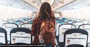 Un passager de première classe interdit à une officier militaire de s'asseoir à sa place dans un avion