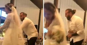 Un marié balance le gâteau de mariage à la tête de sa mariée — Les internautes réclament le divorce