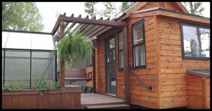 The Best Tiny Home We've Seen Yet Comes Complete With A Greenhouse And A Porch Swing
