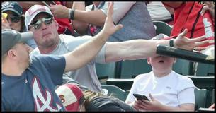 While Everyone Else Ducks For Cover, This Father's Quick Thinking Saves His Son's Life